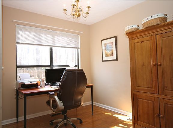Versatile family room. This space used as a home office, possible dining area.