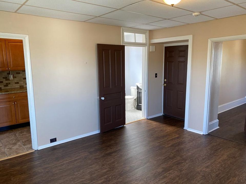 In living room, but entrances to Bathroom, Kitchen, and Bedroom are visible