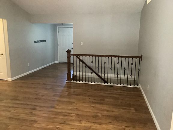 Stairway leads to partially, professionally finished basement
