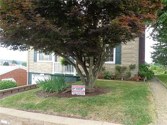 Level Front Yard and pleasant back yard.