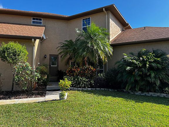 side landscaped entrance 