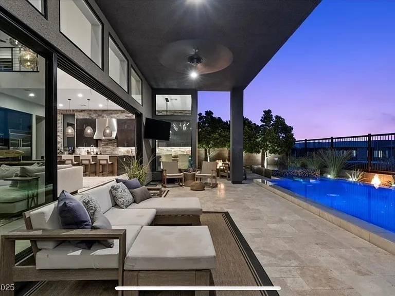 #GuardianRealty 10941 Earth Hues Summerlin Luxury Home Rental twilight covered patio_07032026