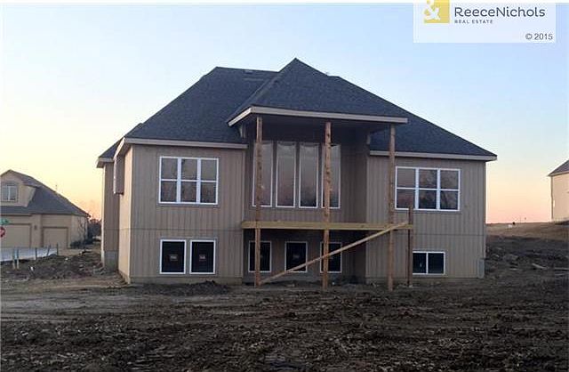 Actual Home. Large daylight basement windows allow for plenty of light.  Large covered deck for enjoying  the sunset. Exterior paint and deck stairs coming soon!