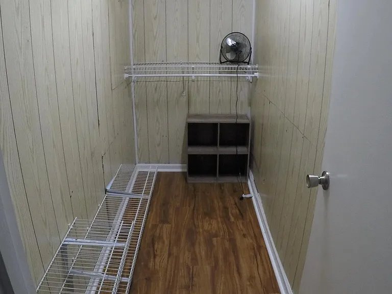 Spacious walk-in closet in master suite