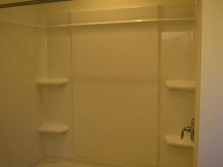 Secondary Bathroom Tub and Shower.