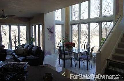 Breakfast nook with view of 18th hole. Large skylight above