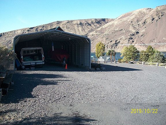 Double carport up by house