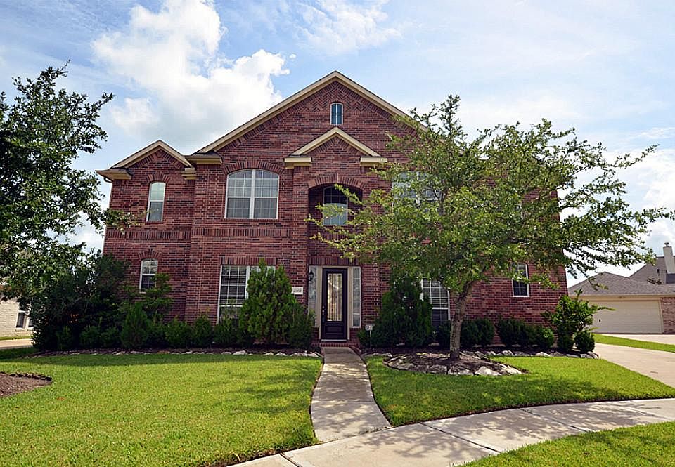 Great home with classic red brick exterior and wonderful floor plan in quiet neighborhood.