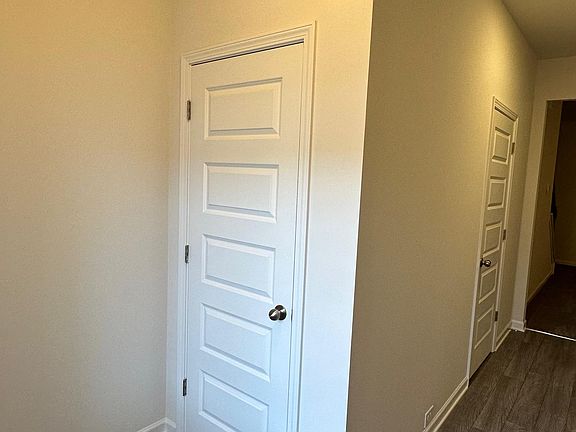 Welcoming foyer with coat storage just inside the entrance_perfect for staying organized.