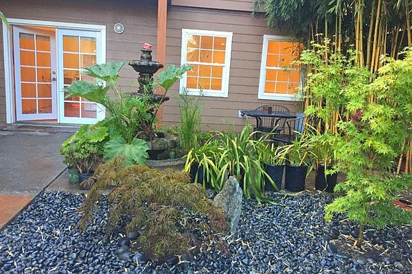Shared Garden Courtyard with fountain and seating area