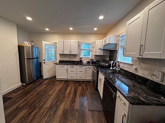 Modern open kitchen, minimalist design, fully renovated