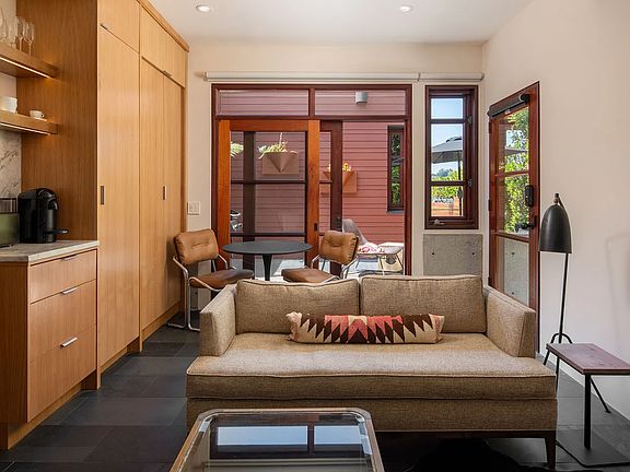 View of living room looking out to private deck