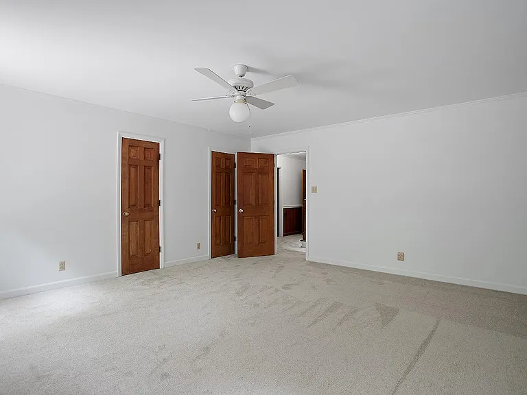 Primary suite with two walk-in closets