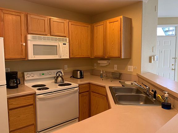 Electric stove, dishwasher, microwave, frig.
