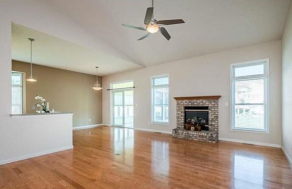 Vaulted ceilings, rich hardwood floors and chic lighting thru-out.