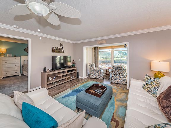 Living Room With Door To Master Bedroom