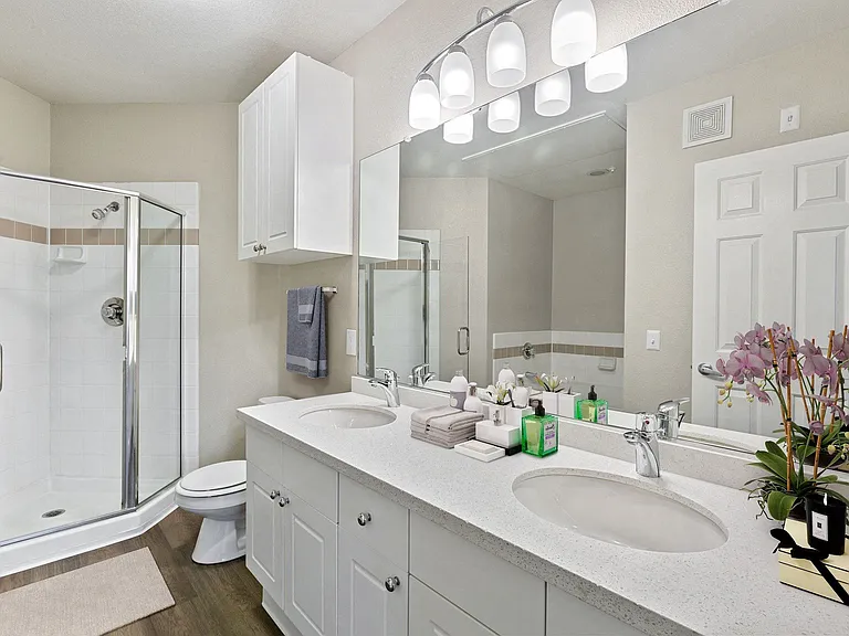 Walk-in showers featured in select bathrooms