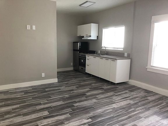 Kitchen - original brick wall has recently been exposed (not shown in picture)