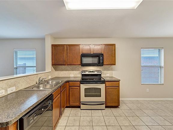 4th image of 9004 Sun Haven Way