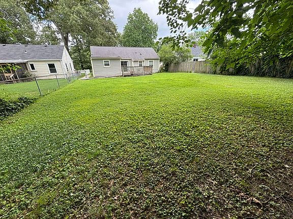 Fully fenced large flat yard.