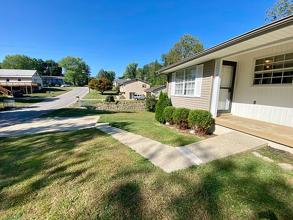 Two Parking Spots, Sidewalk to front door, Front Patio