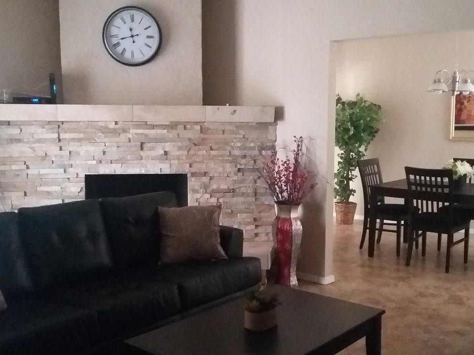 Furnished Living room and formal dining.