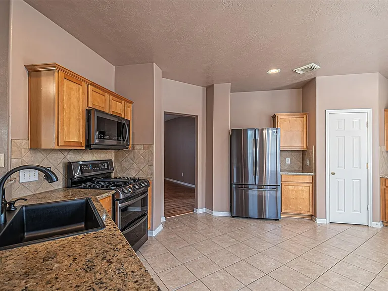 7431 Riven Oaks Ct — Photo 14