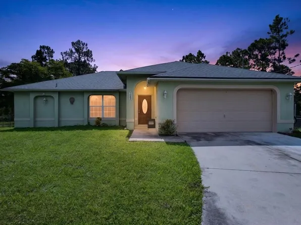 1048 BANDERA STREET, LEHIGH ACRES, FL 33974