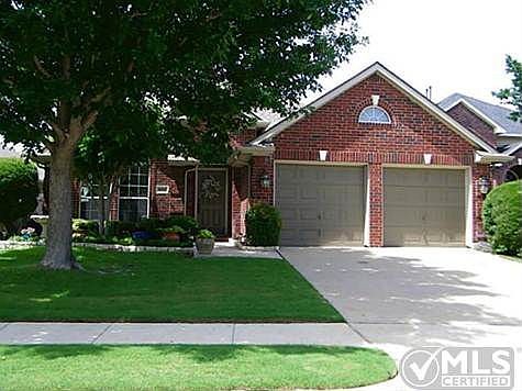 BEAUTIFUL CURB APPEAL W/ BLOOMING FLOWERS AND MATURE TREES!