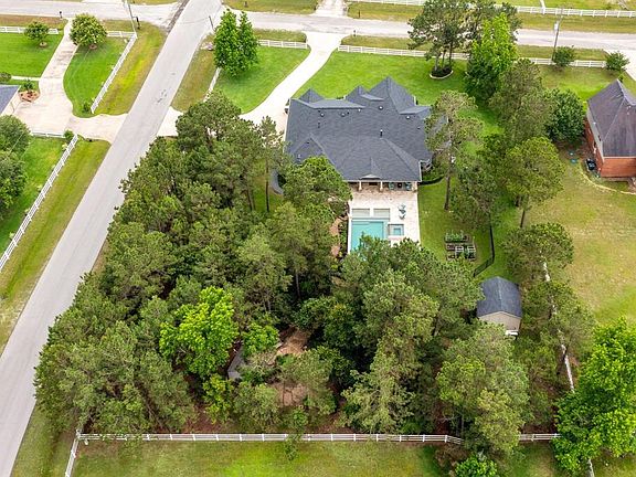 Back of lot is nicely wooded for privacy