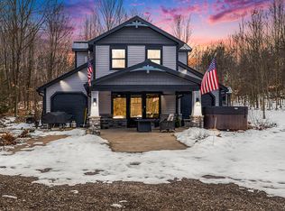 8851 E Eight Mile Rd, Luther, MI 49656