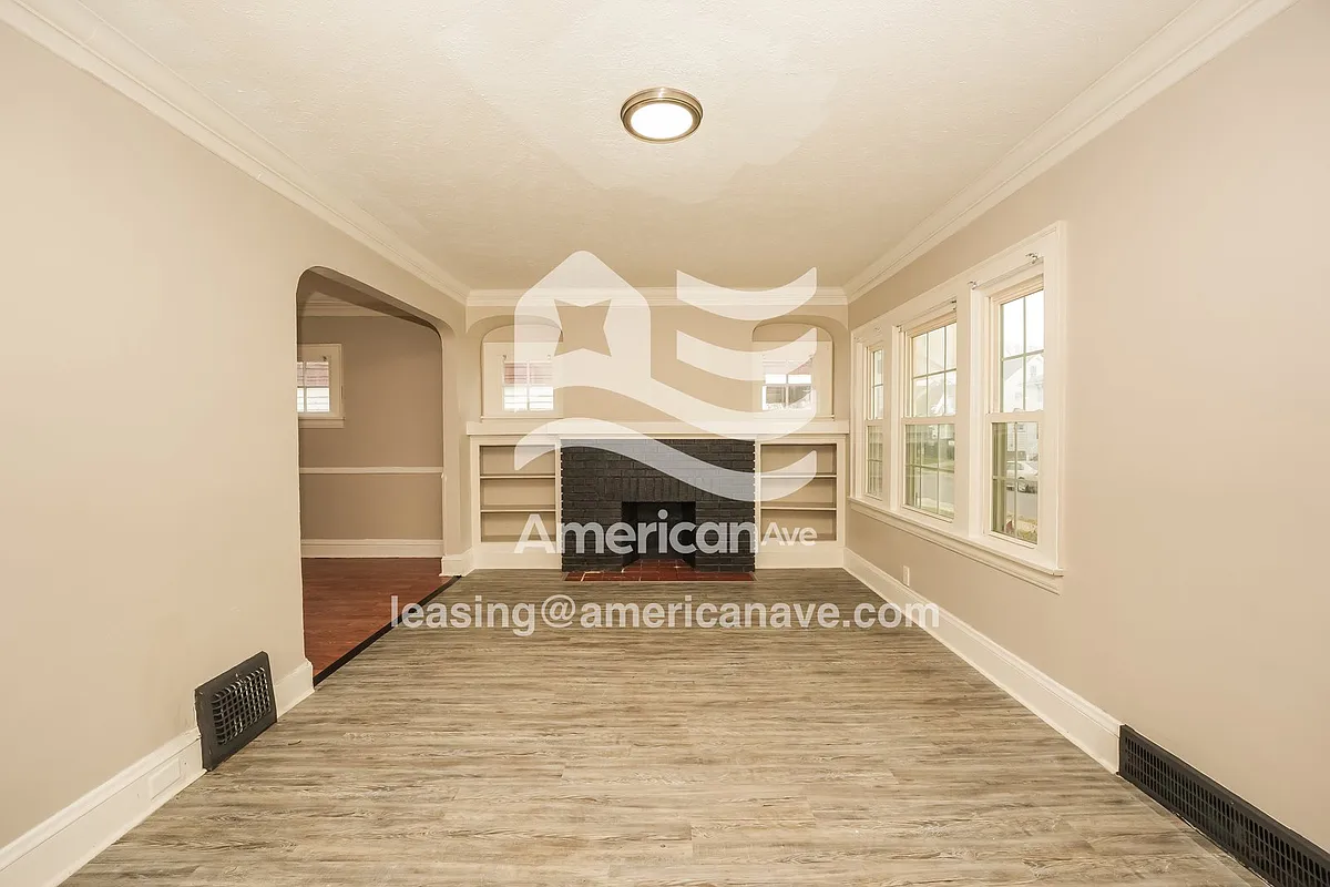1403326_002_living_room_2.jpg - 10909 Park Heights Ave