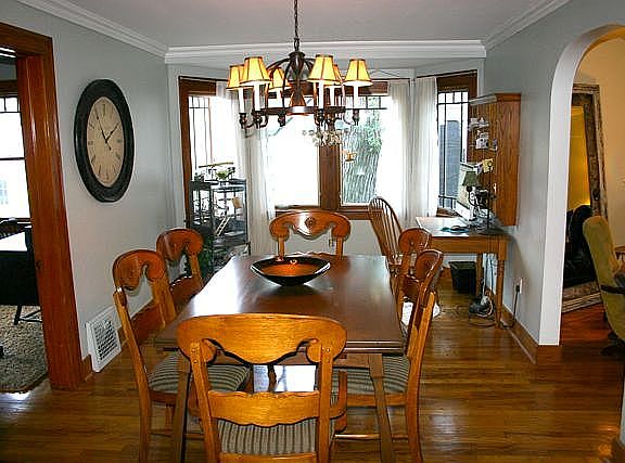 large dining with bow window