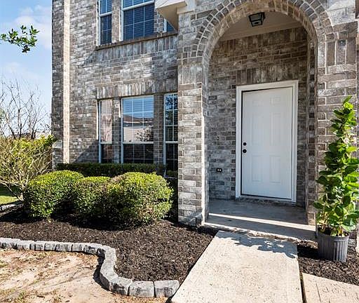 Inviting covered front porch to greet your guests