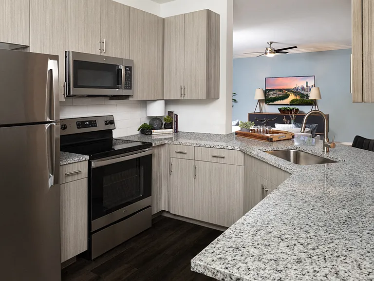 Beautifully remodeled kitchens feature stainless steel appliances