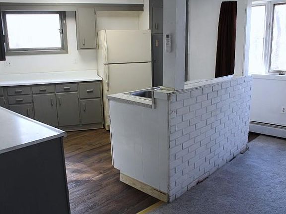Kitchen area; sink in island