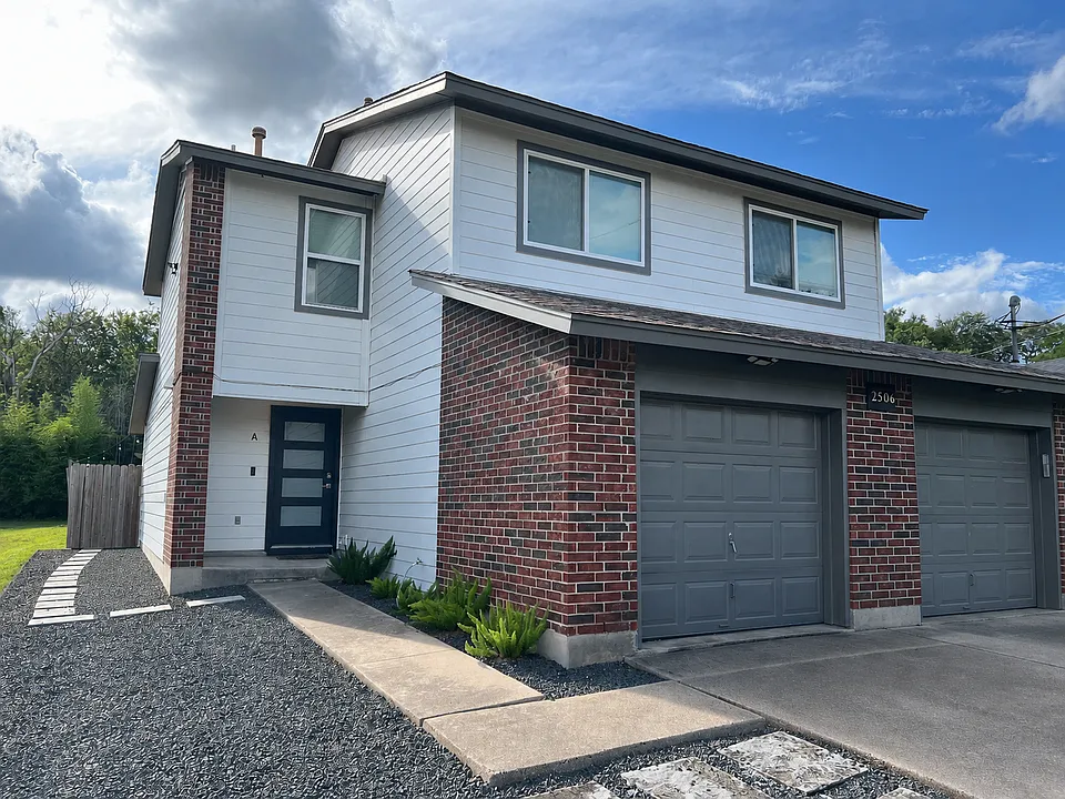 Modern condo in prime 78704 location with a 1-car garage and driveway parking