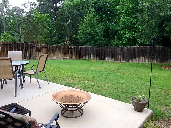 Large back yard with no houses behind you.
