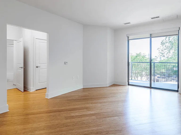 Living Room with Balcony and Hard Surface Flooring