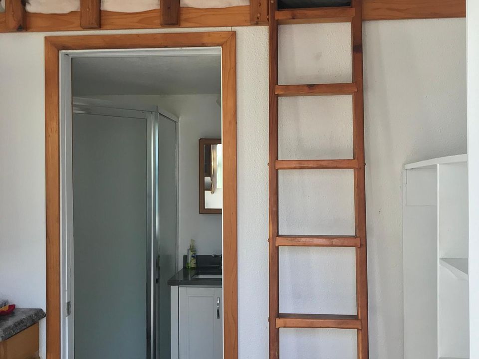 Small mini house with loft bed. very cozy