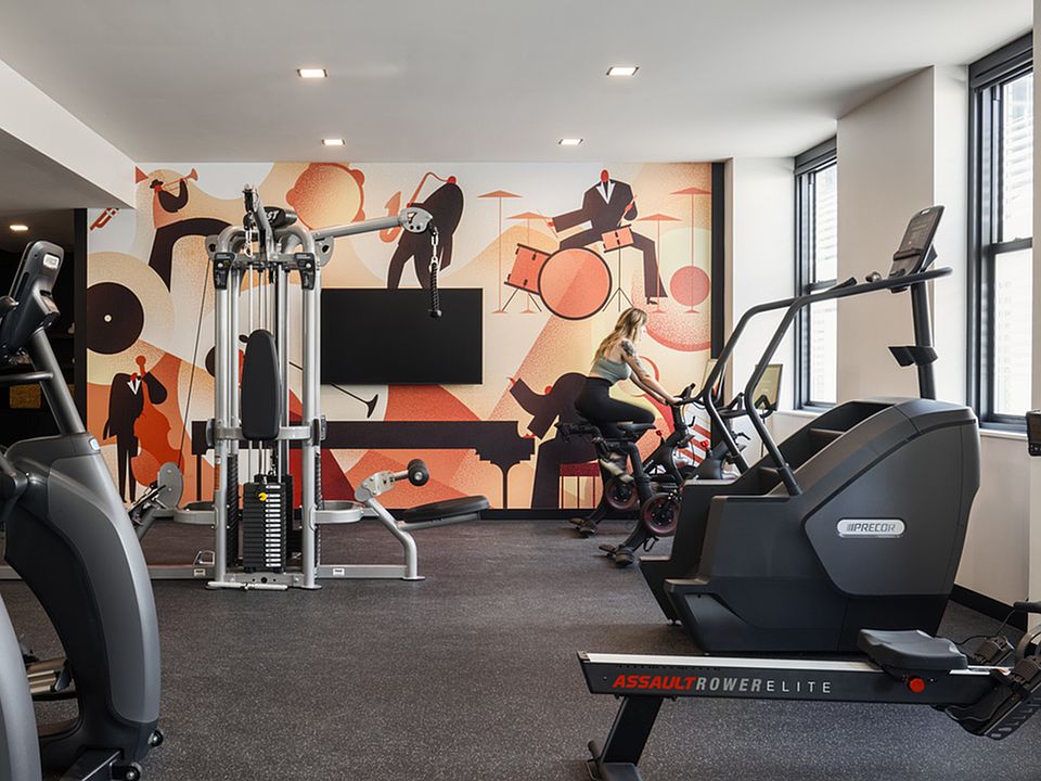 The Fitness Center at Midland Lofts features various exercise equipment including two Pelotons.