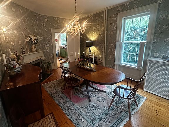 Formal dining room, fireplace not functional.