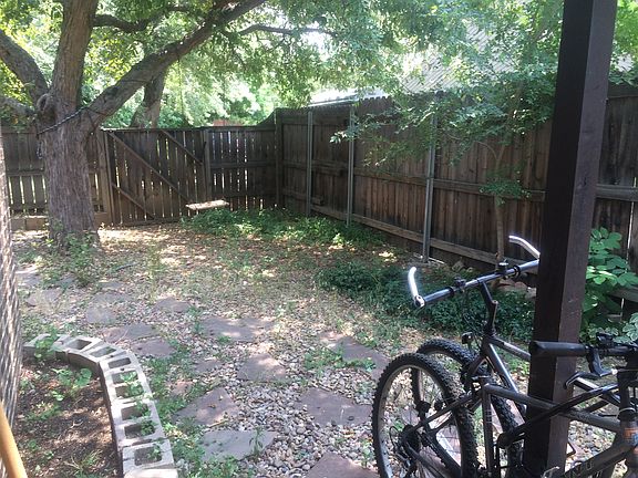 large fenced patio/yard/garden