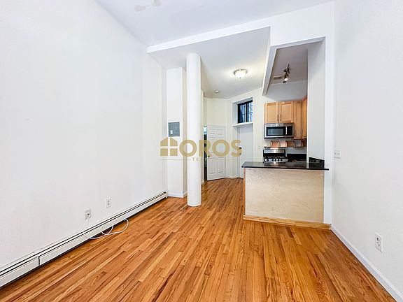5th image of 283 E 7th St APT 1A
