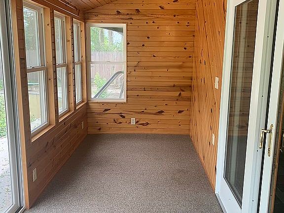 sunroom, leads out to pool