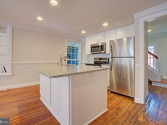 New kitchen with stainless steel appliances
