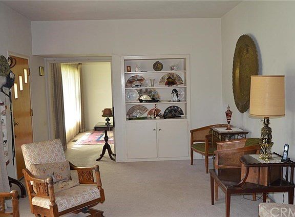 Living Room with built in hutch and seating area