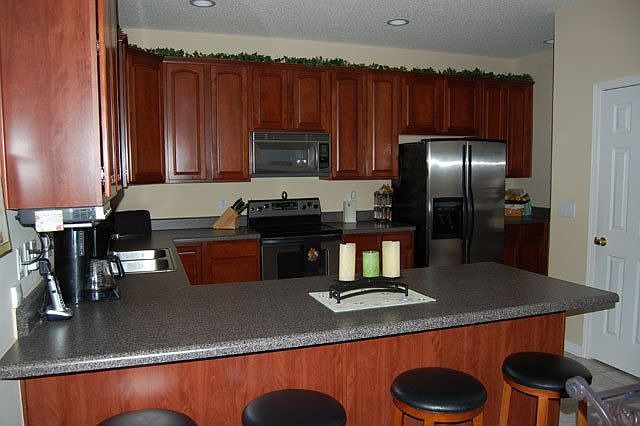 Kitchen w/all stainless steel appliances