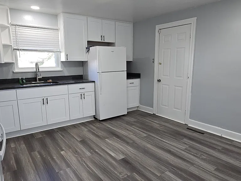 Fully remodeled kitchen with space for a kitchen table and dining.