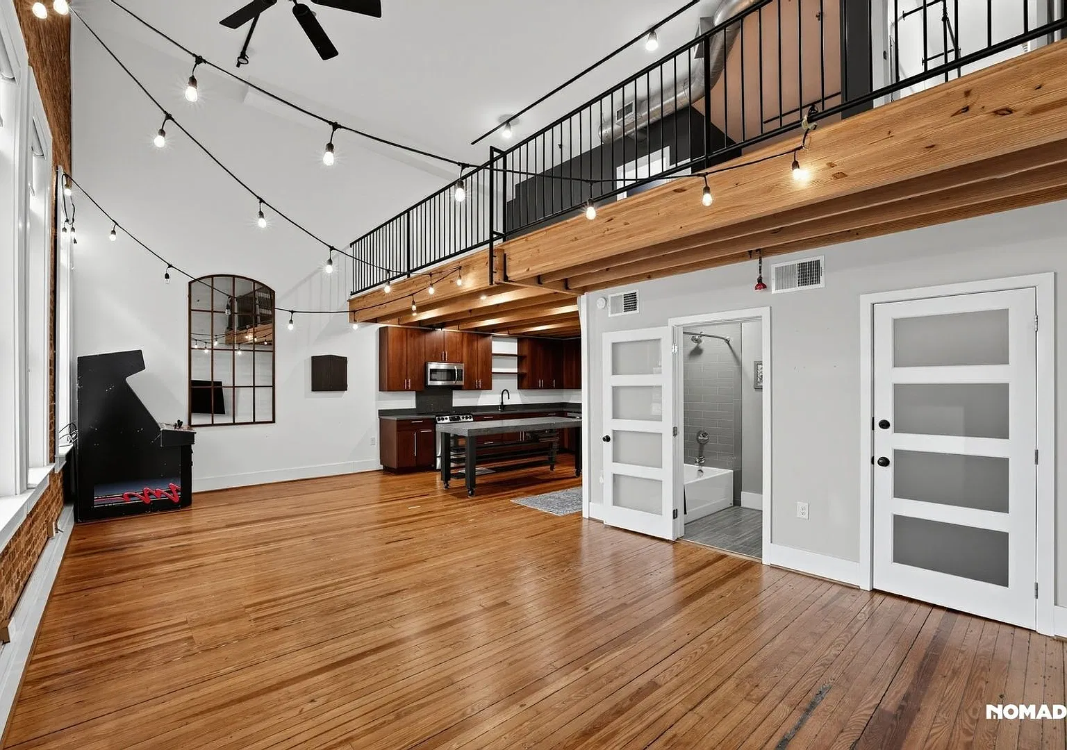 Huge Lofted Condo Overlooking Main Street — Photo 2